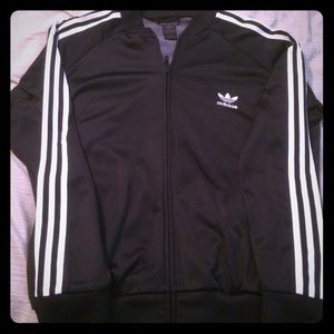 Black and white Adidas track jacket.